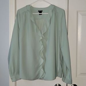 Ruffle front blouse with button front closure